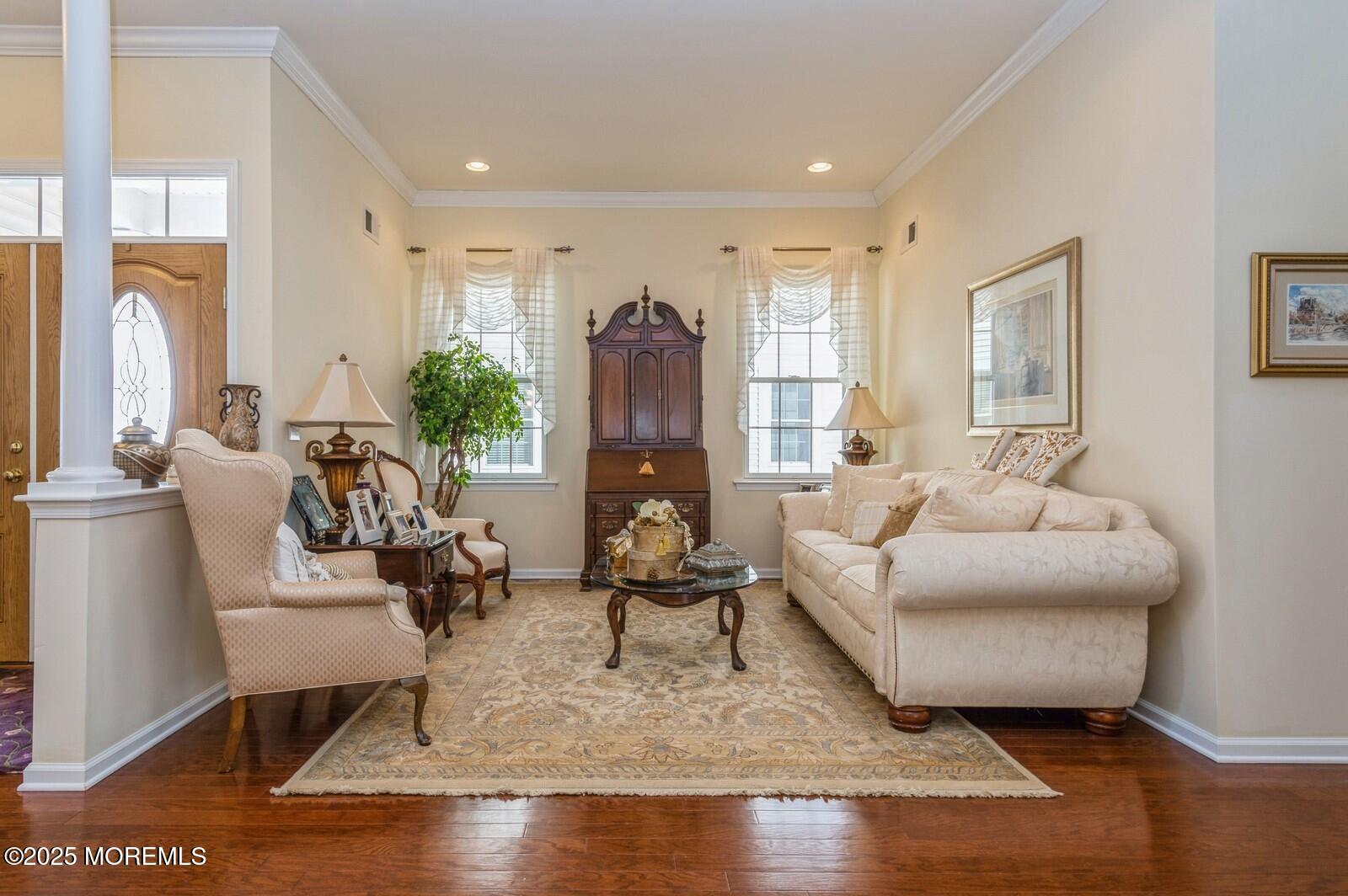 15 Eagleswood Drive Waretown, NJ 08758 - Photo 5 of 27 a living room with furniture and a large window