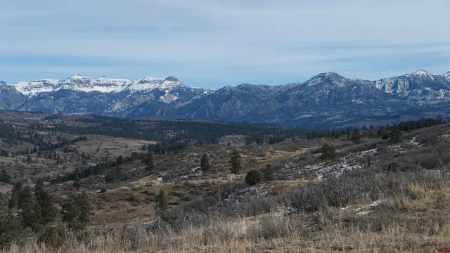 a view of a house with a mountain