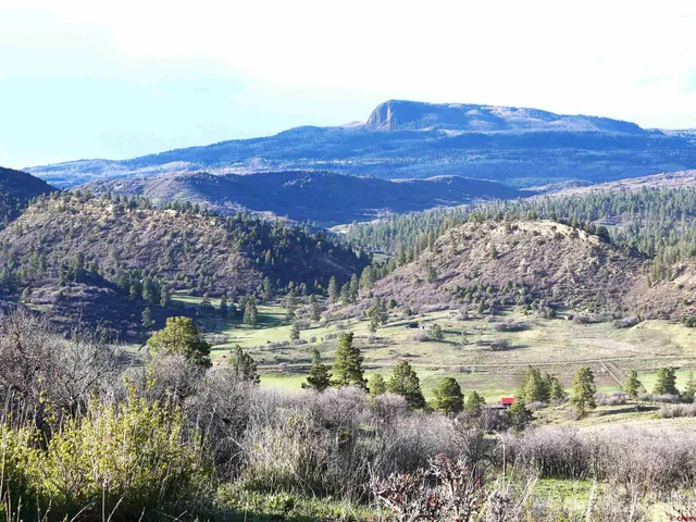 a view of mountain and sunset