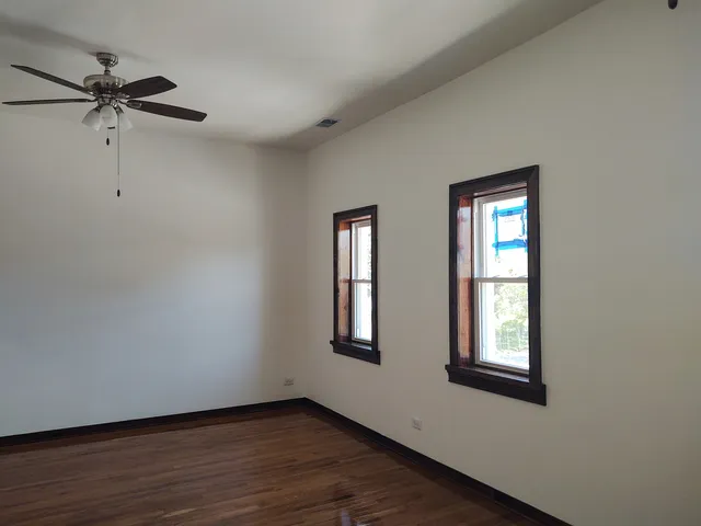 a kitchen with stainless steel appliances granite countertop a refrigerator and a stove