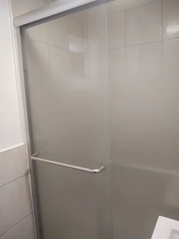 an empty room with wooden floor and closet