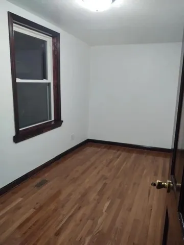 a stove top oven sitting inside of a kitchen