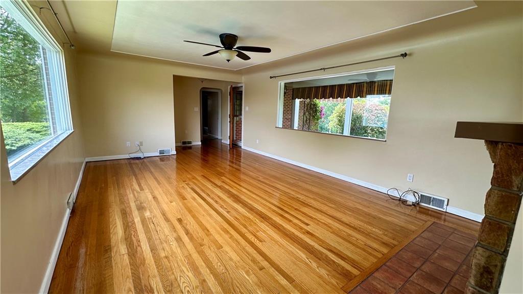 2231 Dellenbaugh Road Tarentum, PA 15084 - Photo 18 of 50 a view of empty room with wooden floor and fan