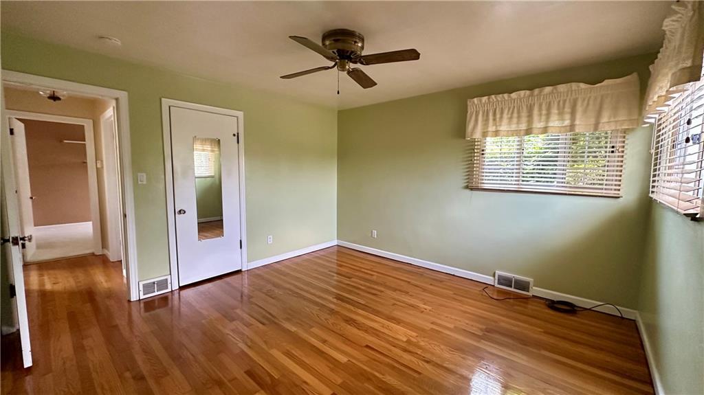 2231 Dellenbaugh Road Tarentum, PA 15084 - Photo 27 of 50 wooden floor in an empty room with a window