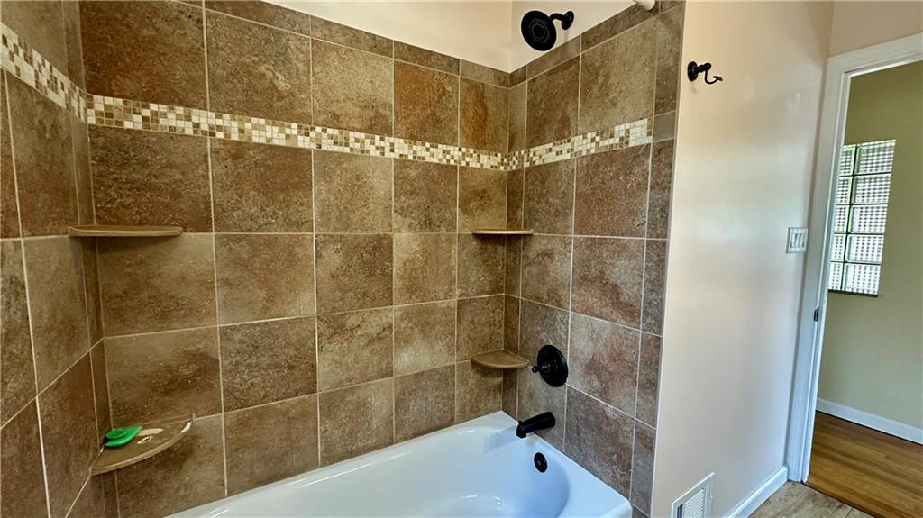 2231 Dellenbaugh Road Tarentum, PA 15084 - Photo 31 of 50 a bathroom with a bathtub and shower
