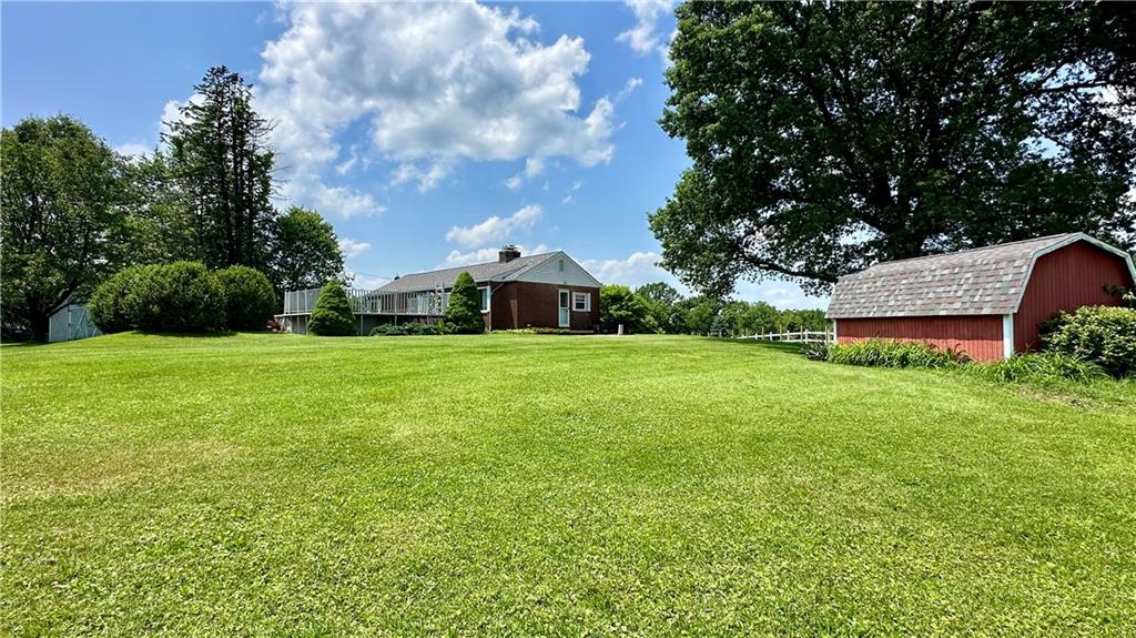 2231 Dellenbaugh Road Tarentum, PA 15084 - Photo 47 of 50 a view of a house with a backyard