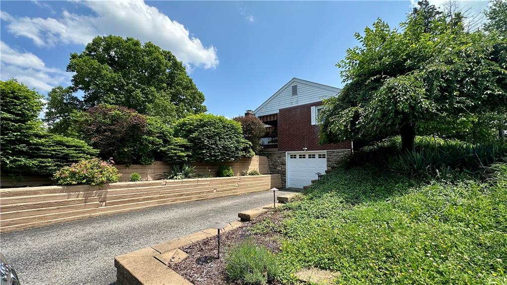2231 Dellenbaugh Road Tarentum, PA 15084 - Photo 5 of 50 a view of a garden with pathway