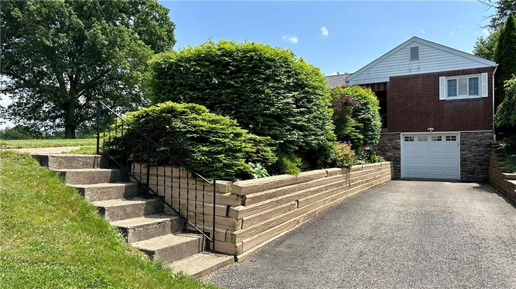 2231 Dellenbaugh Road Tarentum, PA 15084 - Photo 6 of 50 a view of a house with a yard