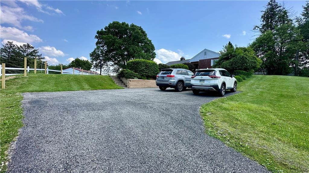 2231 Dellenbaugh Road Tarentum, PA 15084 - Photo 7 of 50 a view of street with parked cars