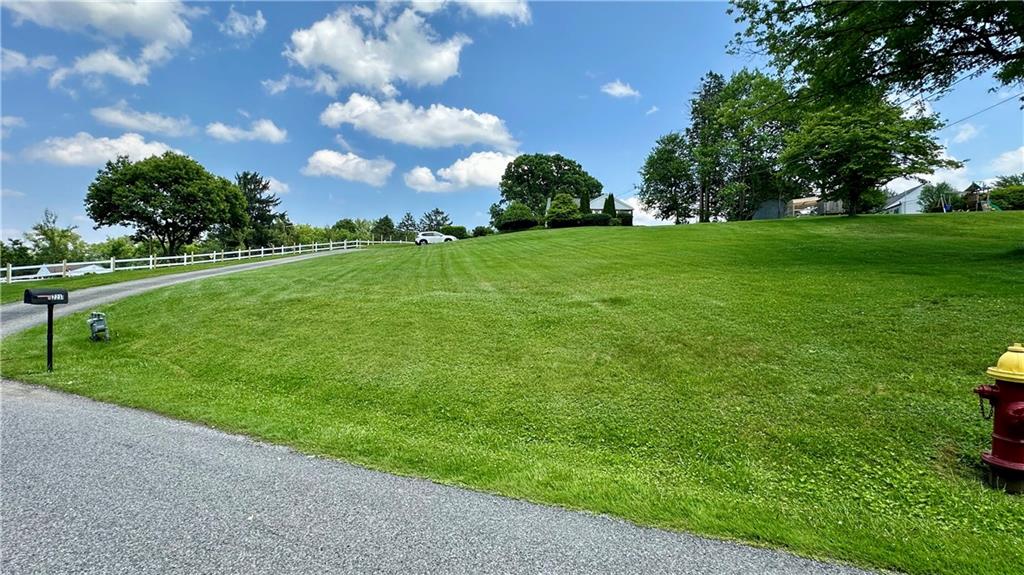 2231 Dellenbaugh Road Tarentum, PA 15084 - Photo 9 of 50 a view of a grassy field with an trees