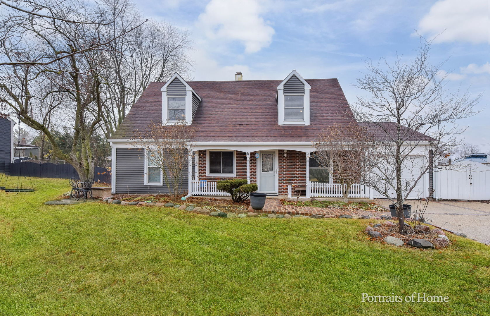 a front view of a house with patio