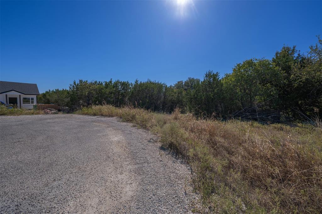 Tbd Tbd Tbd Weatherford, TX 76085 - Photo 11 of 13 a view of a field with trees in the background