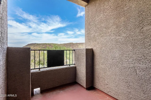 a view of balcony with a flat screen tv