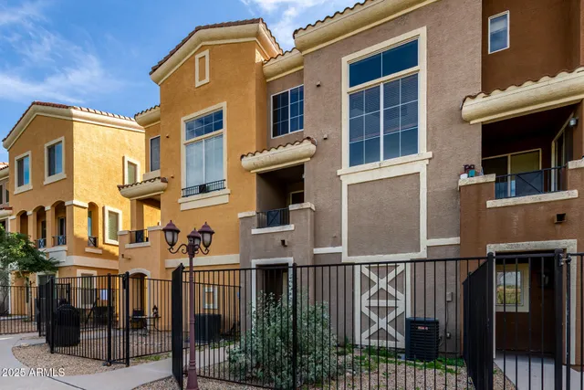 a front view of a house with glass windows
