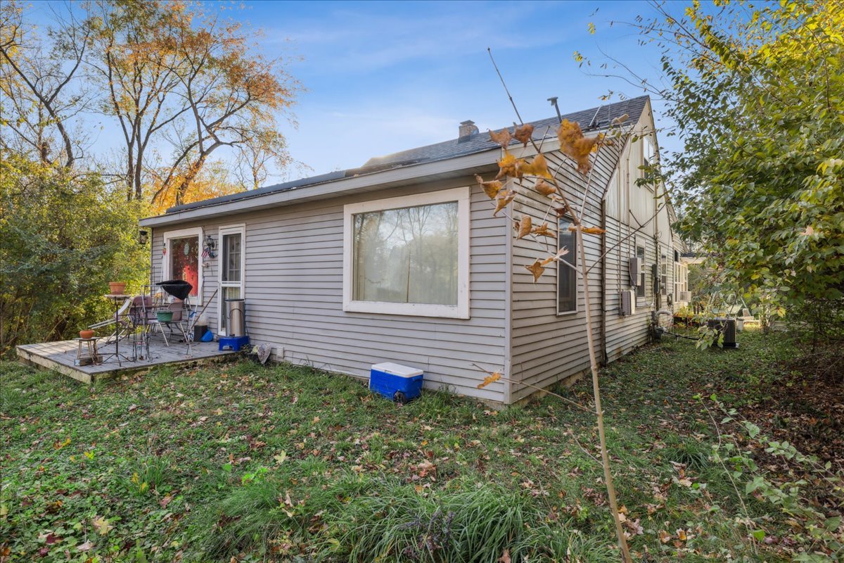 29652 West Roberts Road Island Lake, IL 60042 - Photo 2 of 13 a backyard of a house with table and chairs