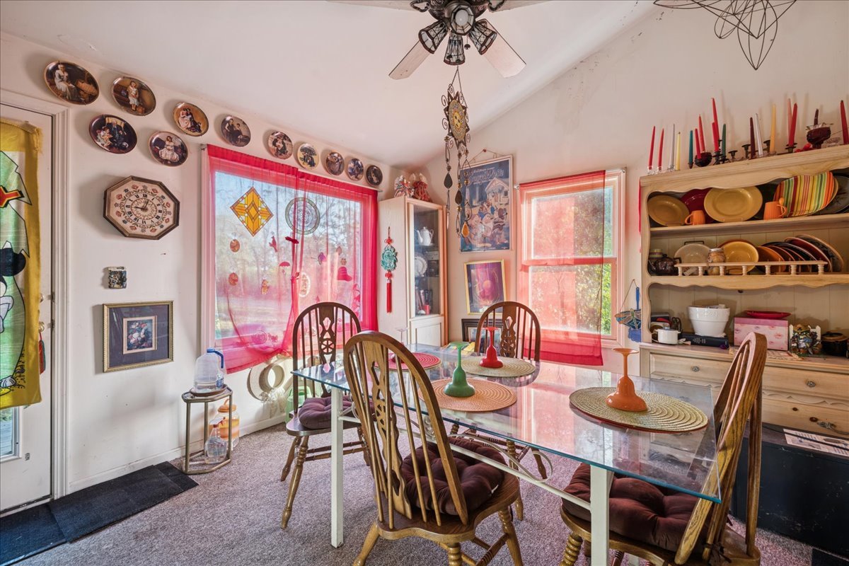 29652 West Roberts Road Island Lake, IL 60042 - Photo 7 of 13 a view of a dining room with furniture and chandelier