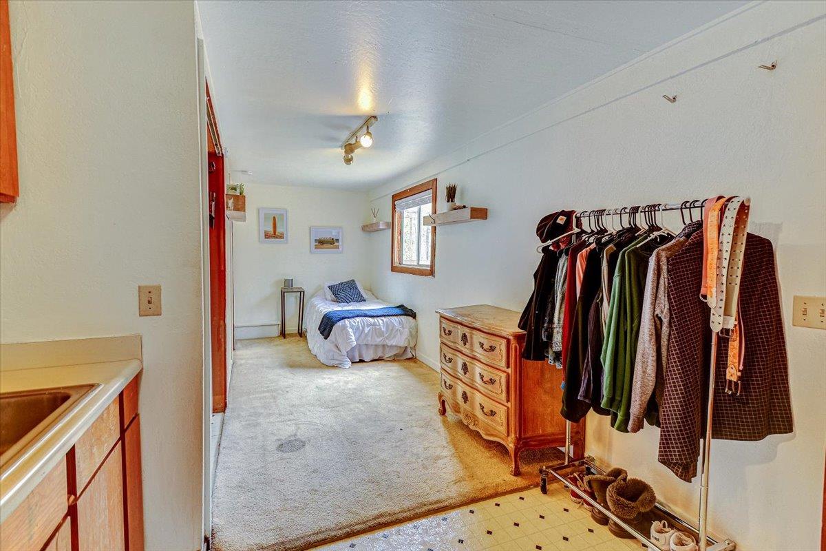 5 Rocca Drive Fairfax, CA 94930 - Photo 24 of 45 a view of walk in closet with clothes and shoes