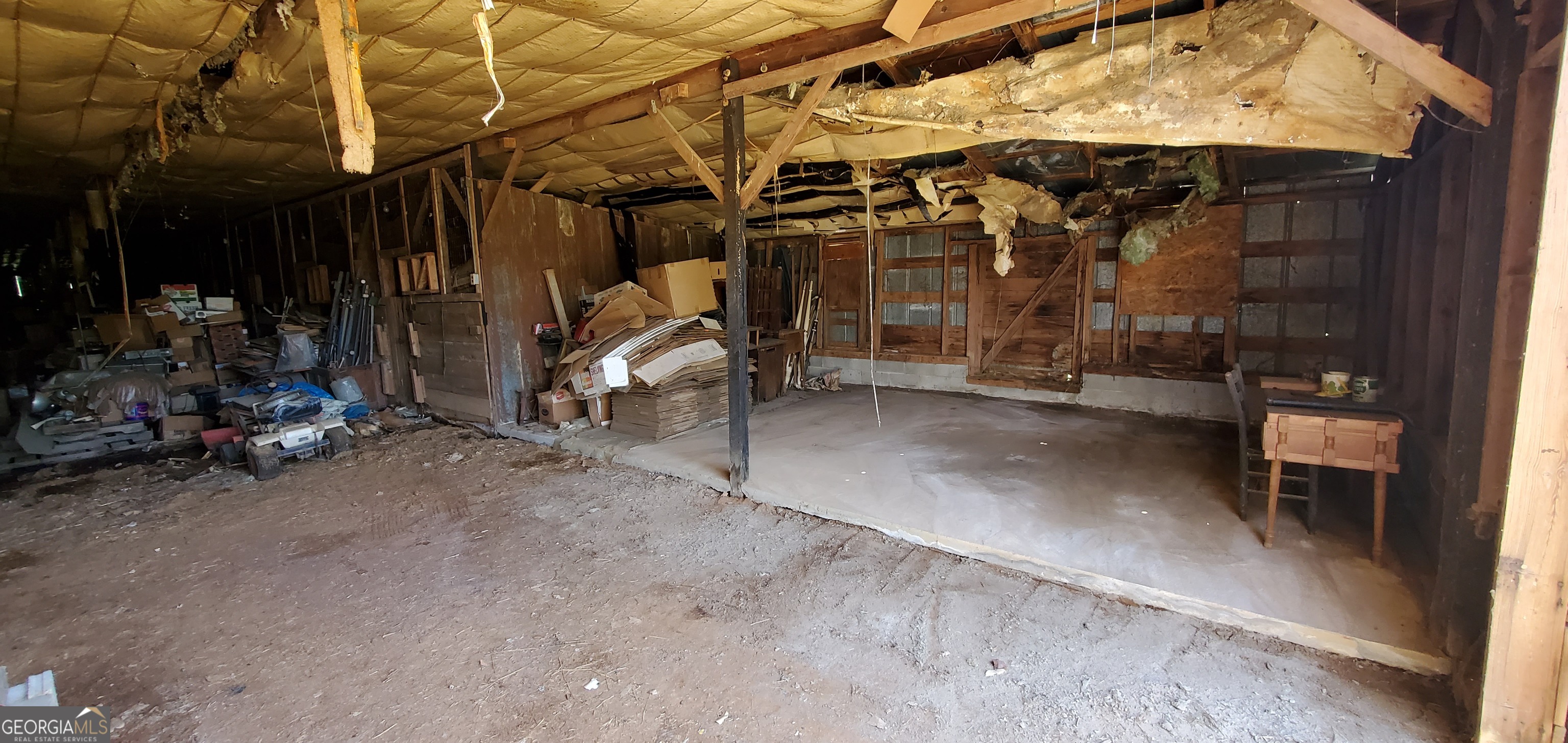 1135 Burger Road Watkinsville, GA 30677 - Photo 12 of 20 a view of a room with wooden walls