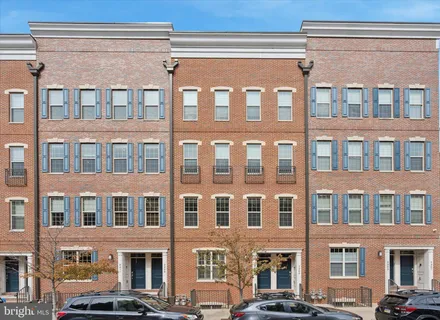 a front view of a building with windows