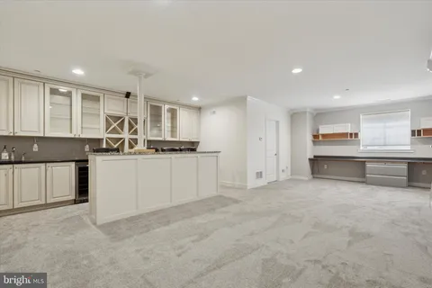 a view of a kitchen with a sink cabinets and window