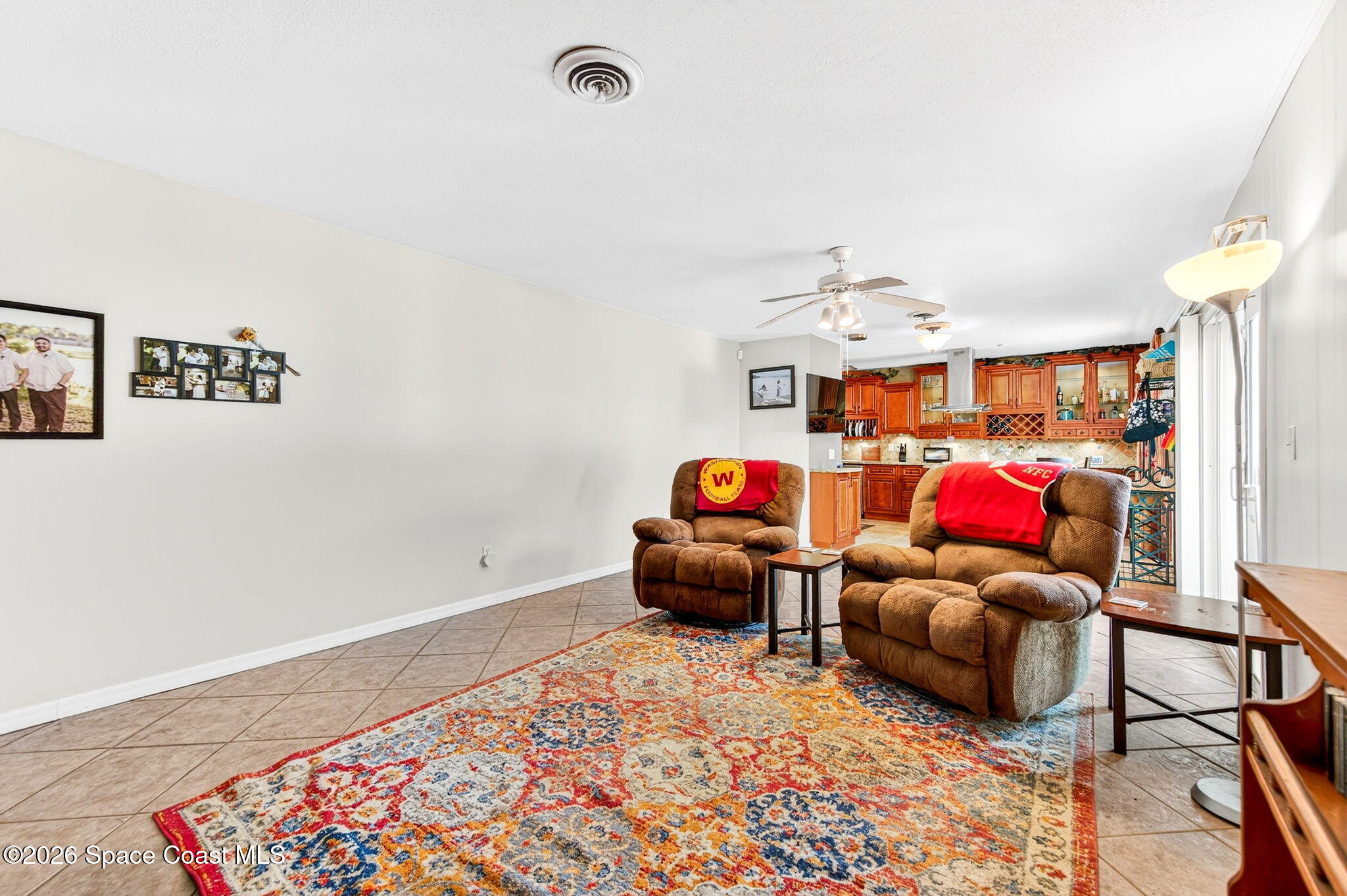 1857 North Carpenter Road Titusville, FL 32796 - Photo 15 of 51 a living room with furniture and a rug