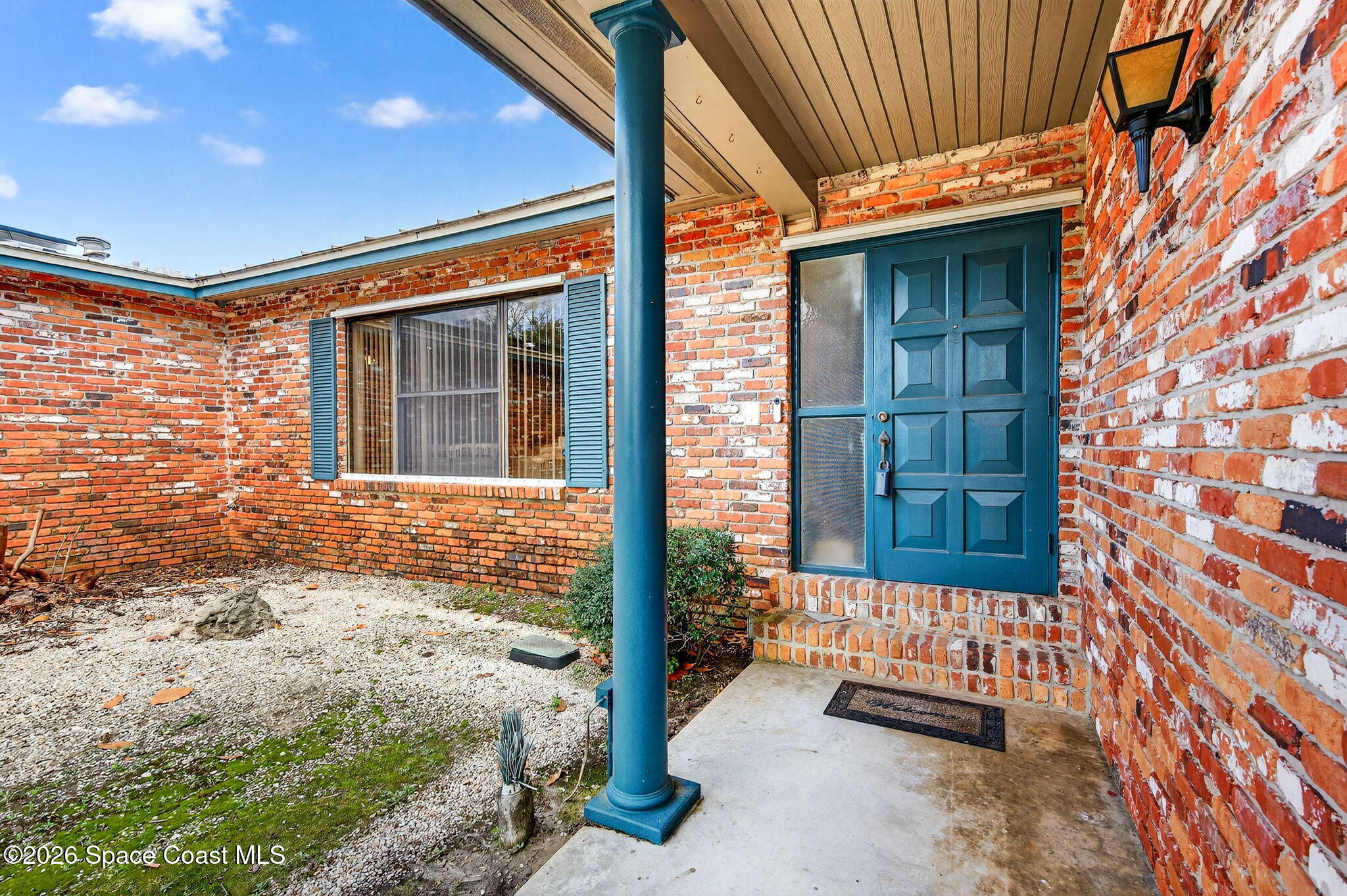 1857 North Carpenter Road Titusville, FL 32796 - Photo 29 of 51 a front view of a house with a porch