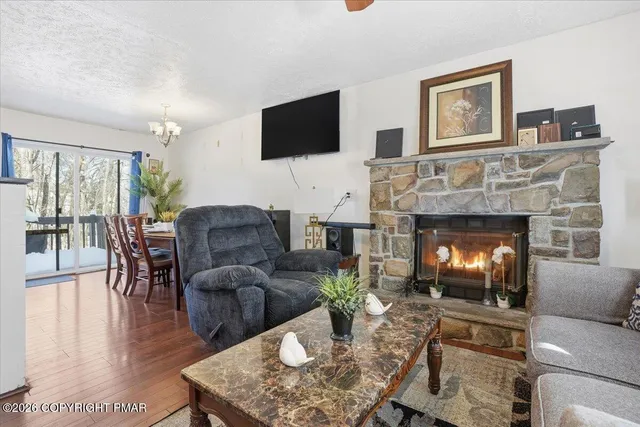 a bedroom with a bed and flat screen tv
