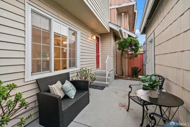 a building outdoor space with patio furniture