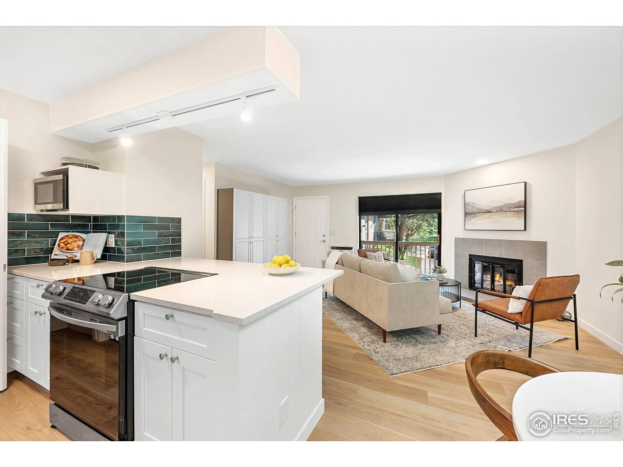 2800 Kalmia Avenue, Unit A-220 Boulder, CO 80301 - Photo 13 of 38 The seamless flow between the kitchen and living areas invites easy entertaining