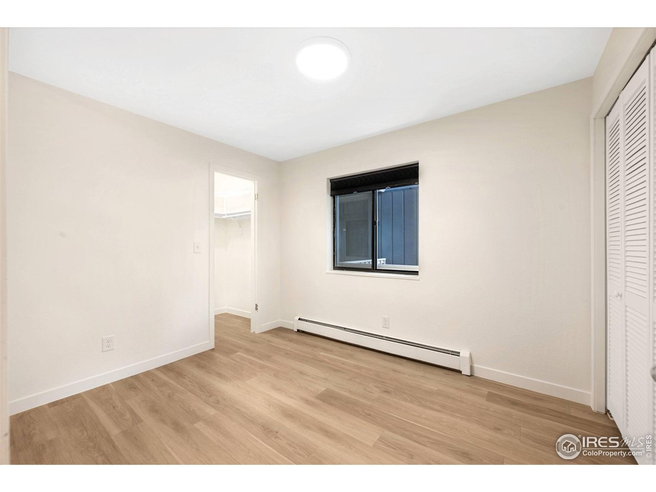 2800 Kalmia Avenue, Unit A-220 Boulder, CO 80301 - Photo 21 of 38 2nd bedroom with newer flooring and 2 closets