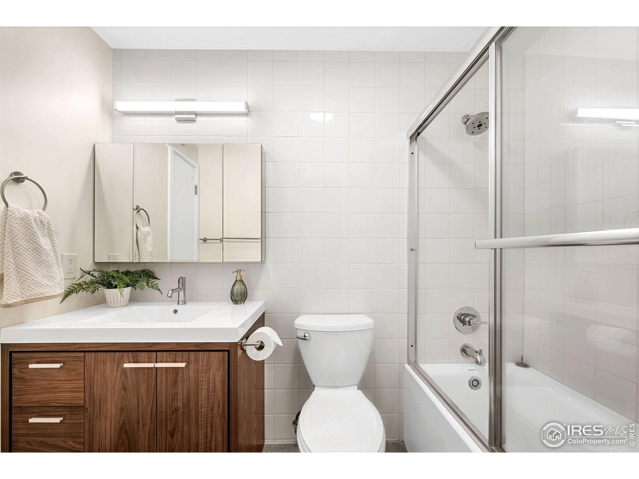 2800 Kalmia Avenue, Unit A-220 Boulder, CO 80301 - Photo 24 of 38 Hallway full bath with newer vanity, fixtures, lighting and luxury Duravit soaking tub