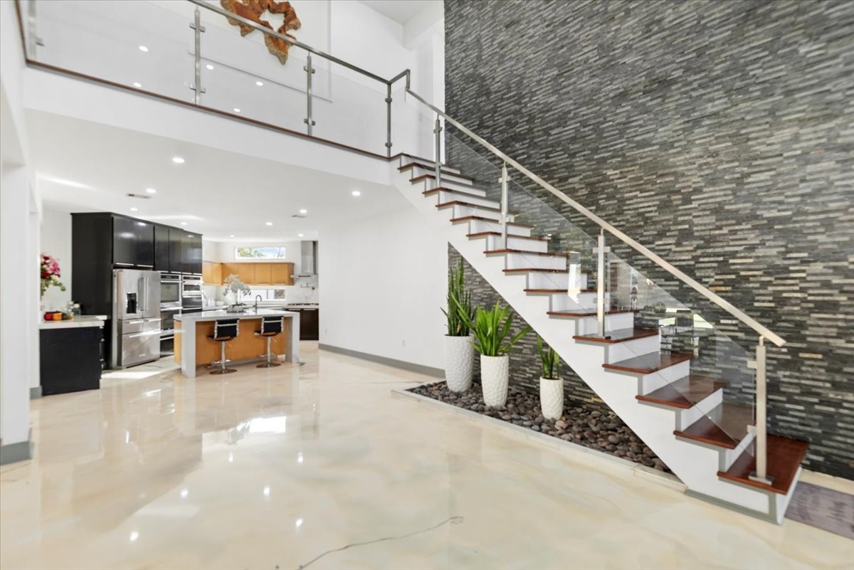 30400 Highland Boulevard Magnolia, TX 77354 - Photo 17 of 50 a view of entryway and kitchen