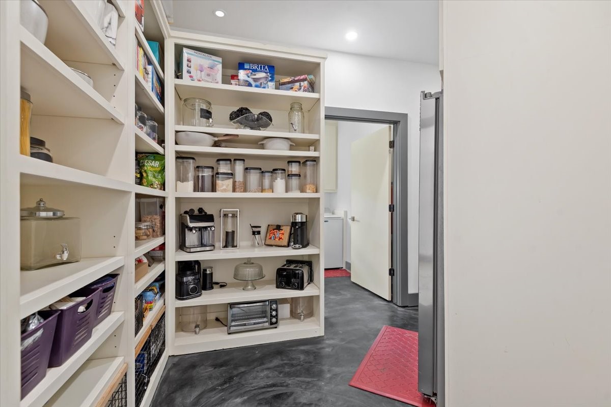 30400 Highland Boulevard Magnolia, TX 77354 - Photo 22 of 50 a view of walk in closet with clothes and shoes