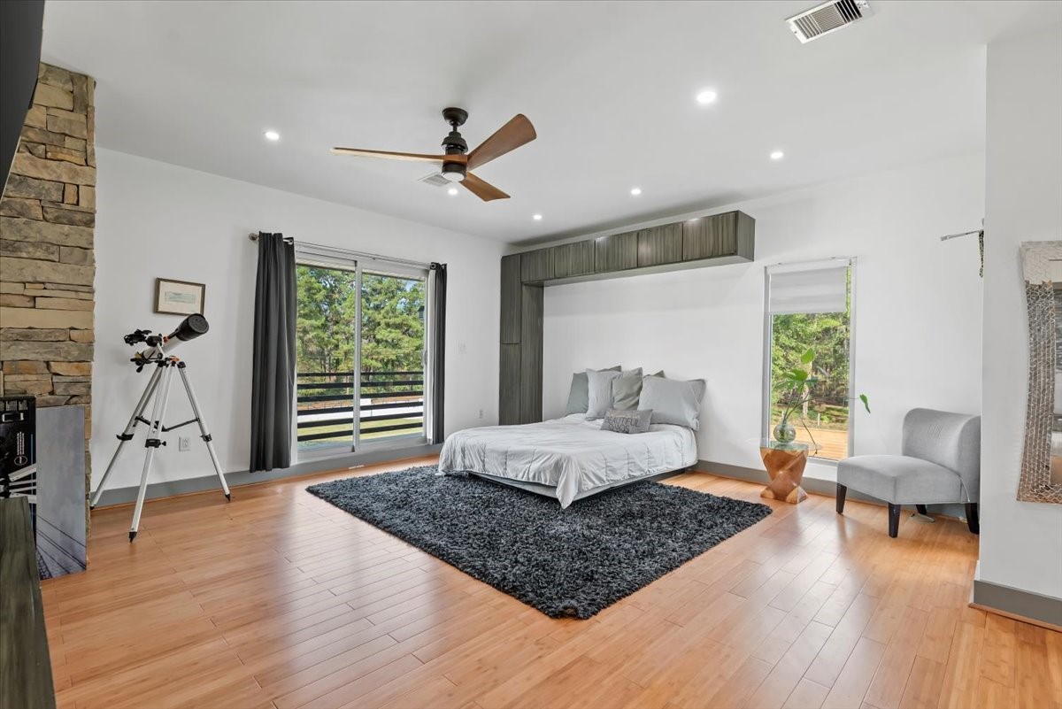30400 Highland Boulevard Magnolia, TX 77354 - Photo 23 of 50 a living room with furniture and wooden floor
