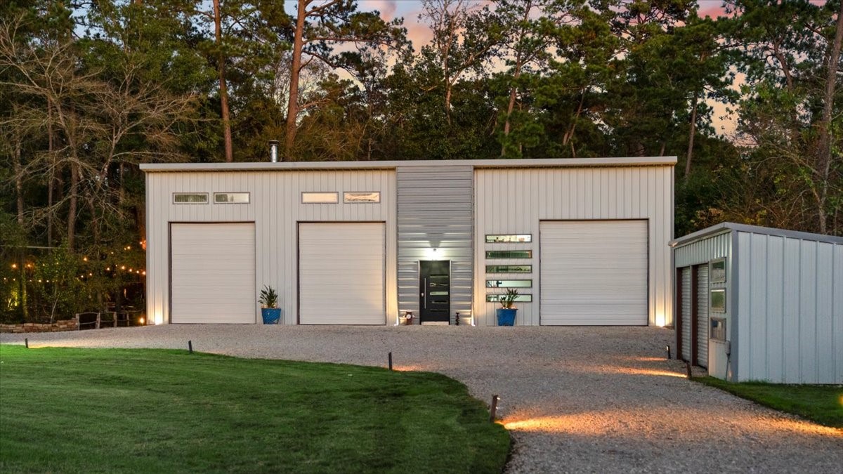 30400 Highland Boulevard Magnolia, TX 77354 - Photo 4 of 50 a view of a house with a big yard and large tree
