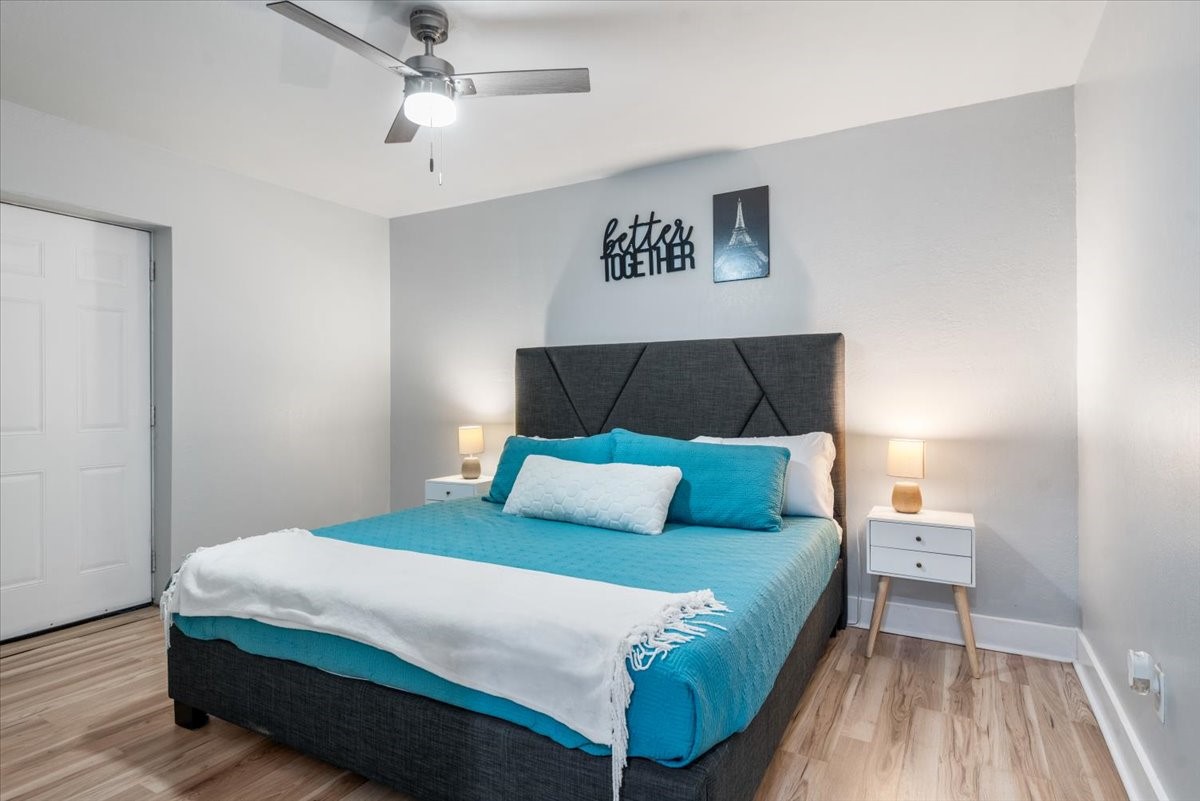 30400 Highland Boulevard Magnolia, TX 77354 - Photo 44 of 50 a bedroom with a bed and a night stand