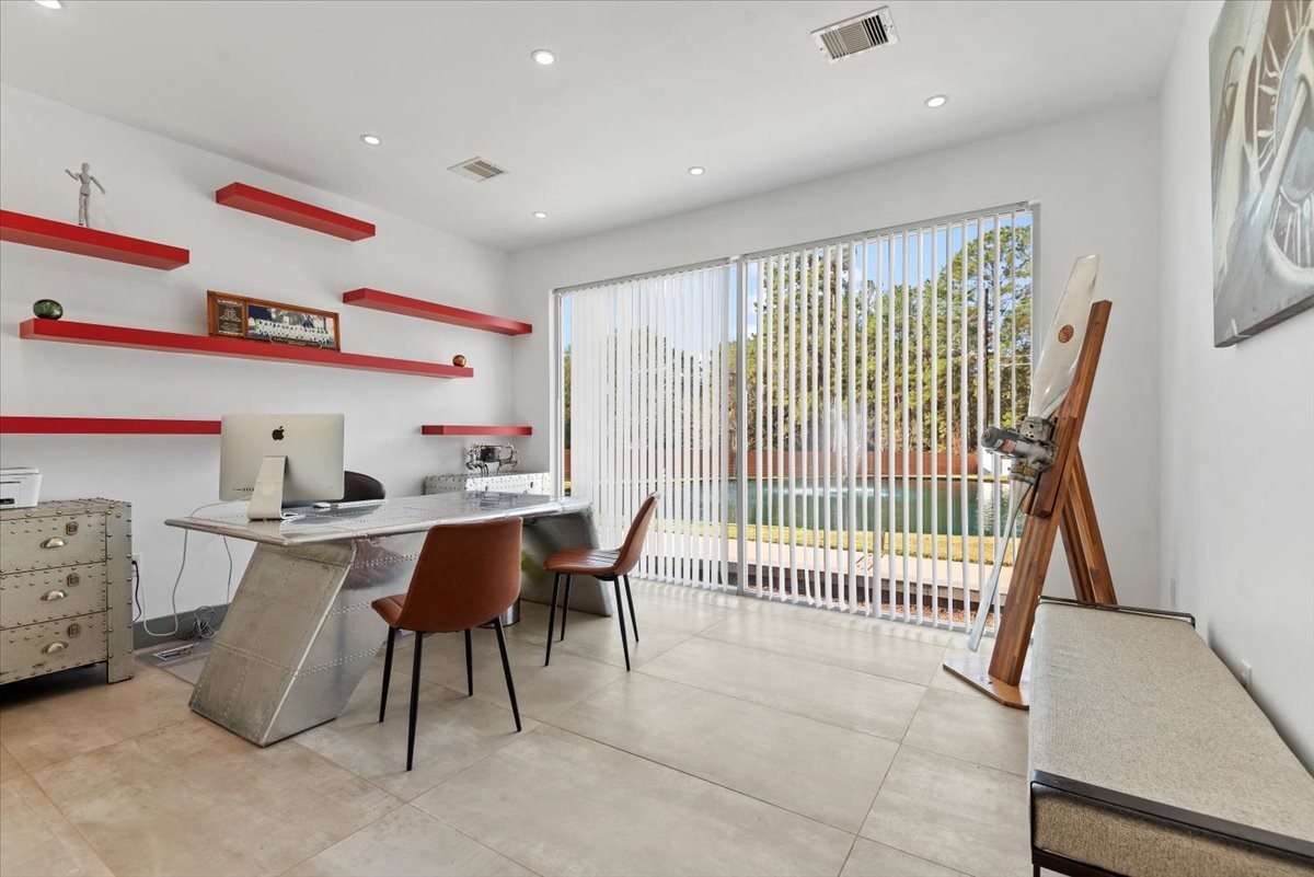 30400 Highland Boulevard Magnolia, TX 77354 - Photo 7 of 50 a view of a dining room with furniture and chandelier