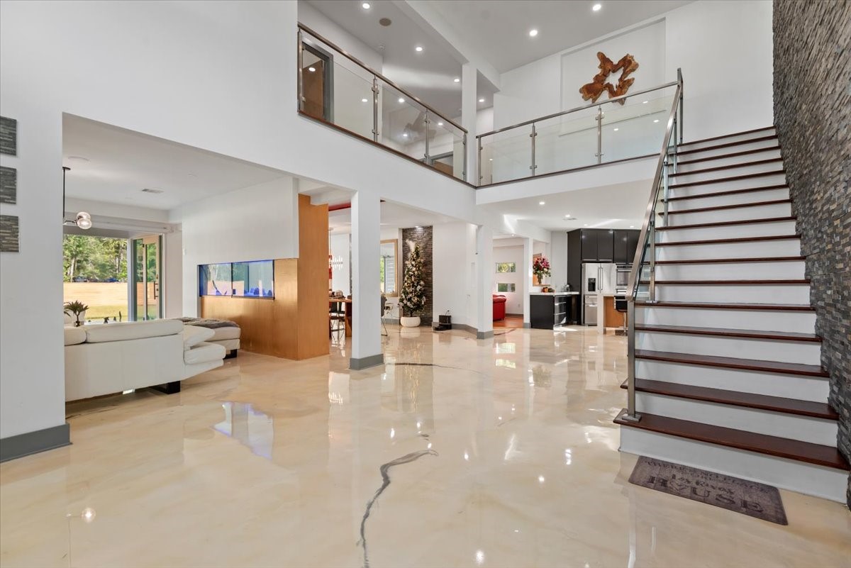 30400 Highland Boulevard Magnolia, TX 77354 - Photo 8 of 50 a view of a living room and entryway