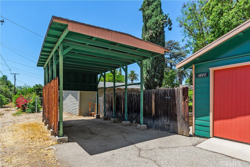3892 Oakwood Place Riverside, CA 92506 - Photo 35 of 36 This shaded RV parking space is part of the property as well.