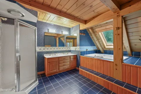 a view of a hallway with washer and dryer
