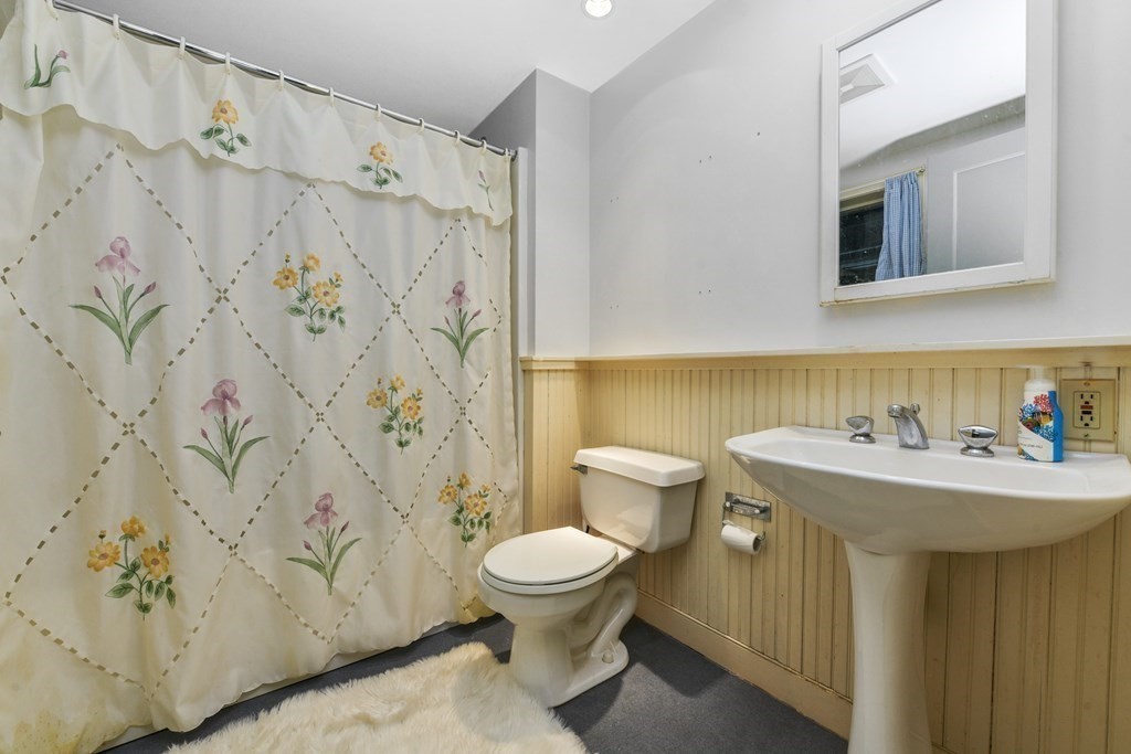28 Tyler Road Belmont, MA 02478 - Photo 20 of 27 a bathroom with a sink and a toilet