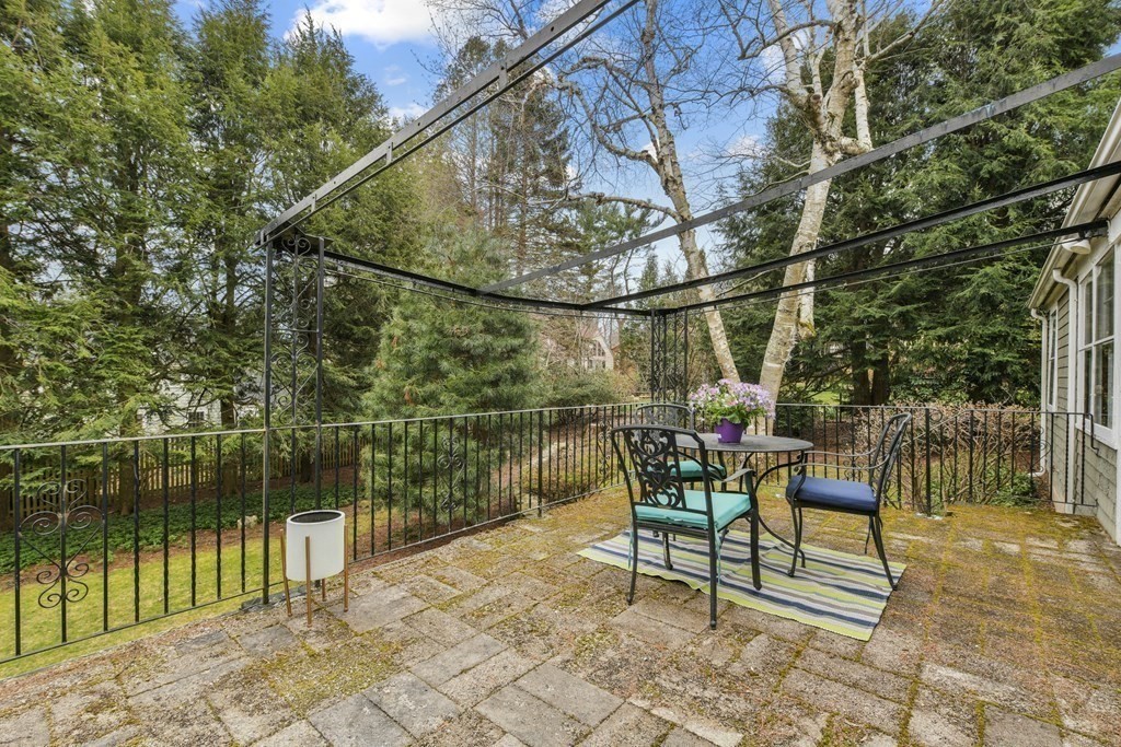 28 Tyler Road Belmont, MA 02478 - Photo 23 of 27 a patio with table and chairs