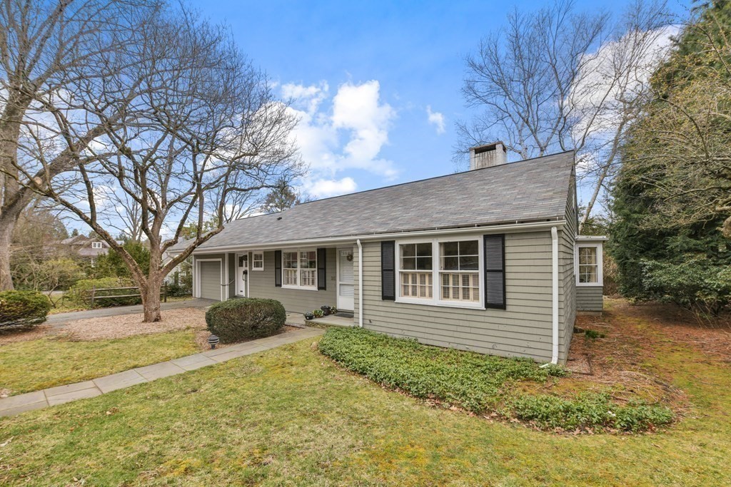 28 Tyler Road Belmont, MA 02478 - Photo 3 of 27 a view of a house with a yard covered in snow