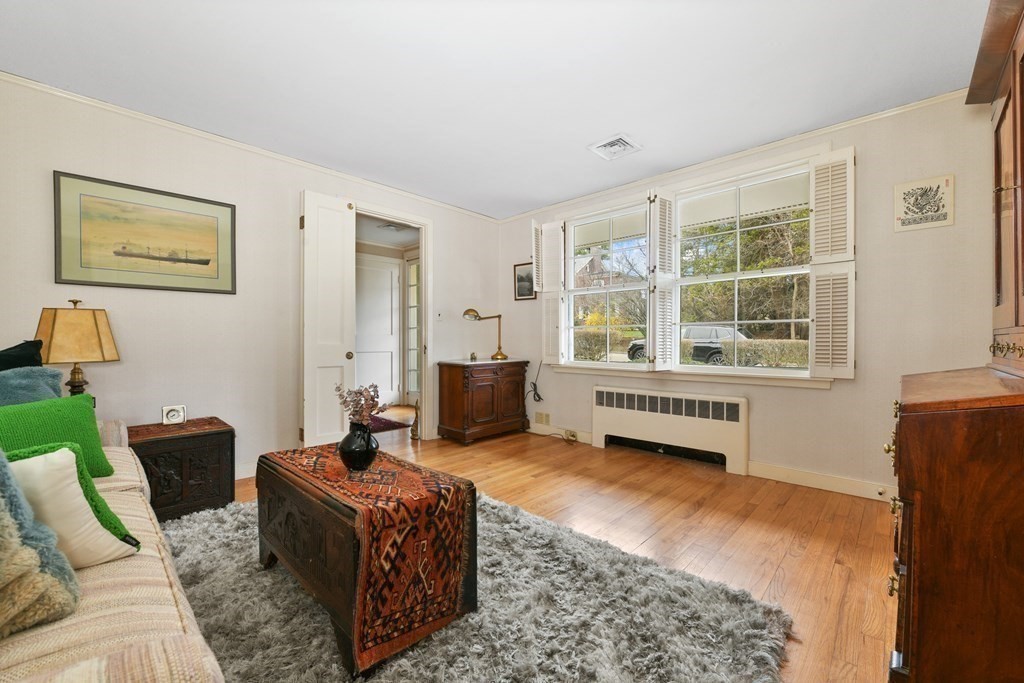 28 Tyler Road Belmont, MA 02478 - Photo 5 of 27 a living room with furniture and a window