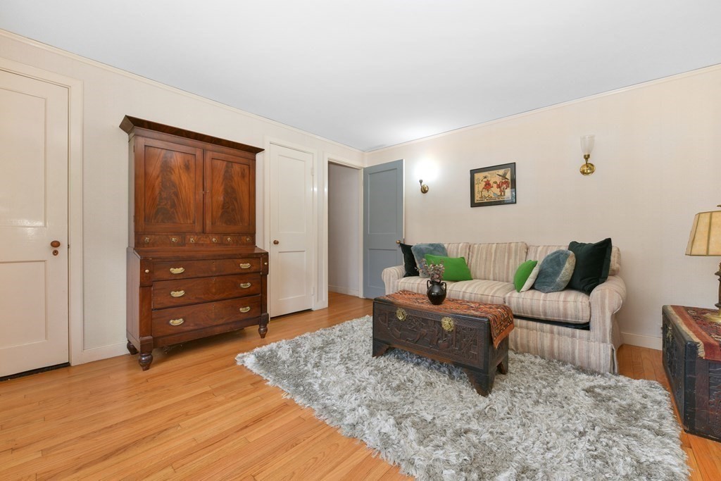 28 Tyler Road Belmont, MA 02478 - Photo 6 of 27 a living room with furniture and wooden floor