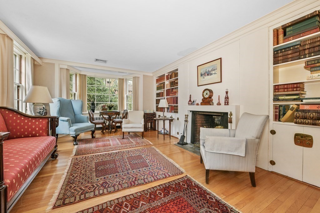 28 Tyler Road Belmont, MA 02478 - Photo 8 of 27 a living room with furniture and a fireplace