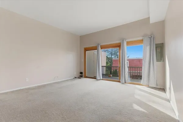 wooden floor and window in an empty room