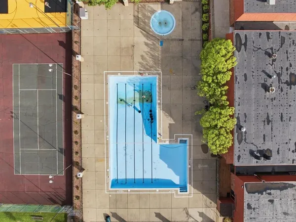 an aerial view of residential building with outdoor space