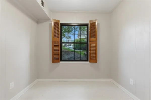 a view of a small space with a window