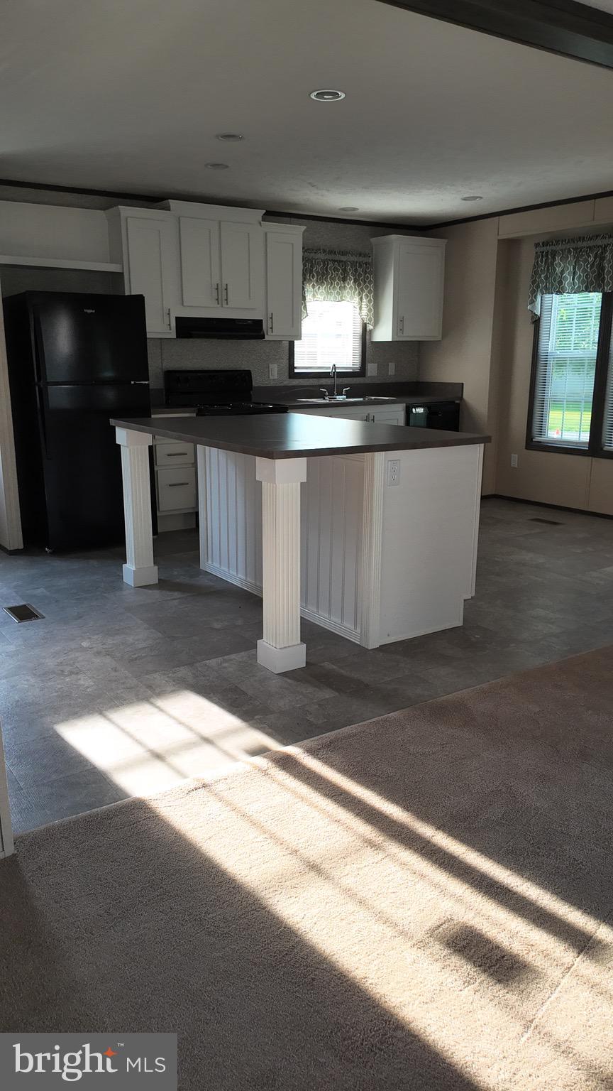 2110 Scull Street Lebanon, PA 17046 - Photo 3 of 13 a kitchen with stainless steel appliances granite countertop a stove a sink and a microwave